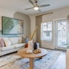 living room with a coffee table and cream couch