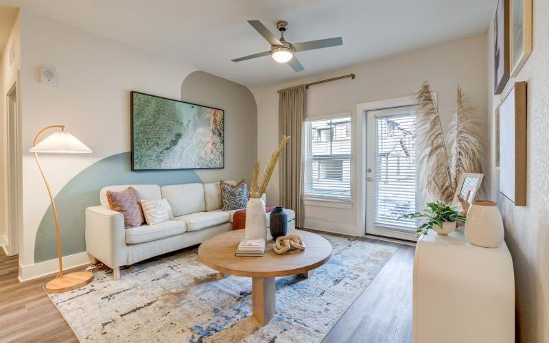 a living room with a couch and a table